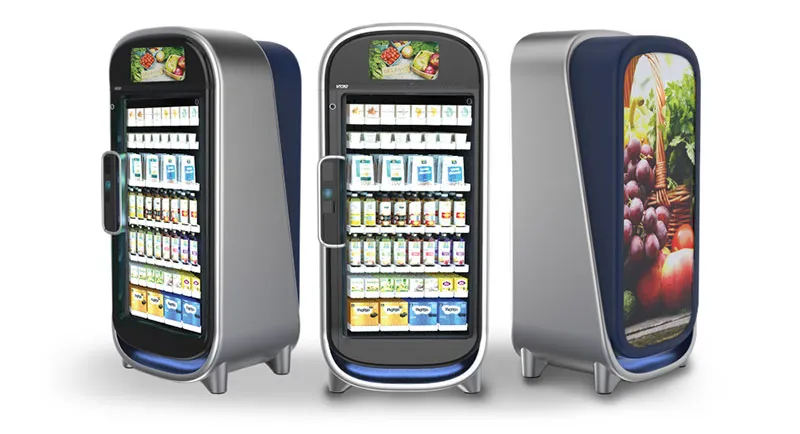 Three views of the VICKI smart store showing its touchscreen, stocked shelves, and branded side panel.